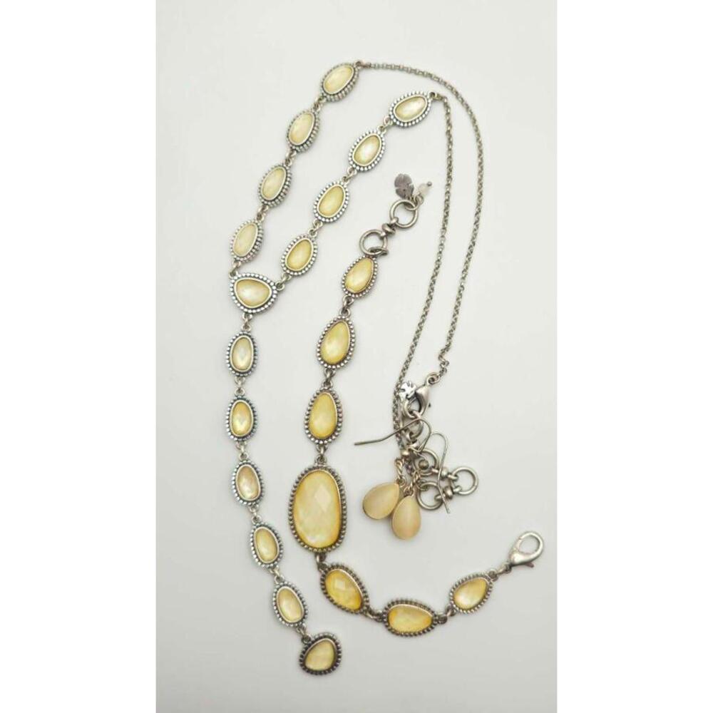 Silver Toned Necklace, Bracelet, & Earrings With Tiered Ivory Oval Stones